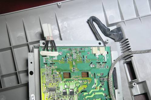 Cover of power supply inside the Medion 30919 PO removed after removing the screws