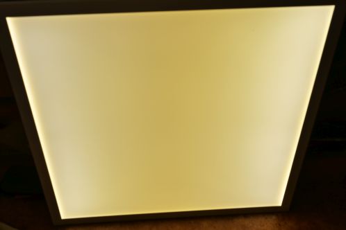A badly discoloured Blinq88 LEDpanel in lighted condition, showing a clear yellow light instead of white